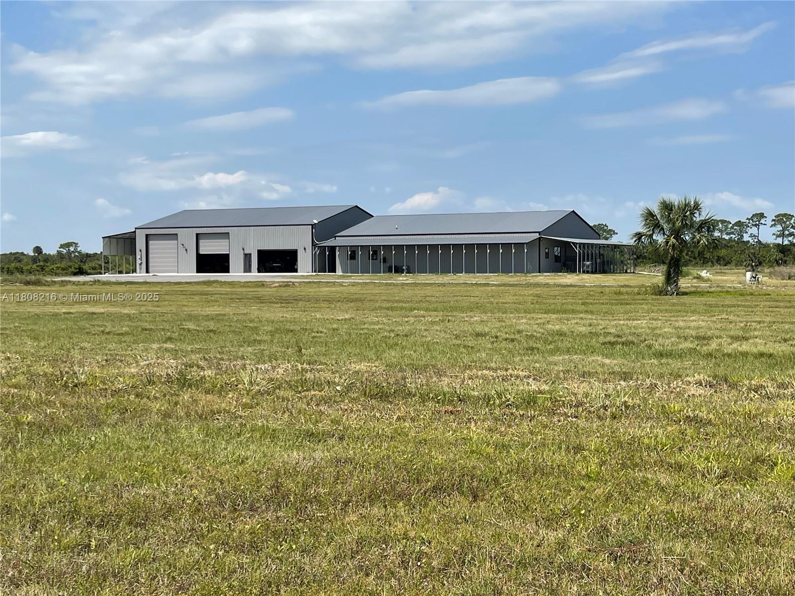 Welcome to your dream homestead or business haven in sunny West Vero Beach, Florida right off the brand new-coming soon I-95/Oslo Exchange for unbeatable access. This 20.25± acre ranch is fully fenced, privacy, and versatility. Property Highlights: 2 Massive Total 7,620 sqft Structure 16’ ceilings, Office space included, Expansive storage for micro-green/hydroponics or convert to a luxurious barn event. Agricultural Zoned A-2 Apiary/Cattle operations. All Equipment incl. Ideal for: Homesteaders & Preppers, Rancheros & Livestock Enthusiasts, Event Venue Creators, Agribusiness Entrepreneurs, Visionaries with big dreams and love for the land, Location, Location, Location: Set in the rapidly developing West Vero Beach corridor, this property is a golden investment in both land and lifestyle