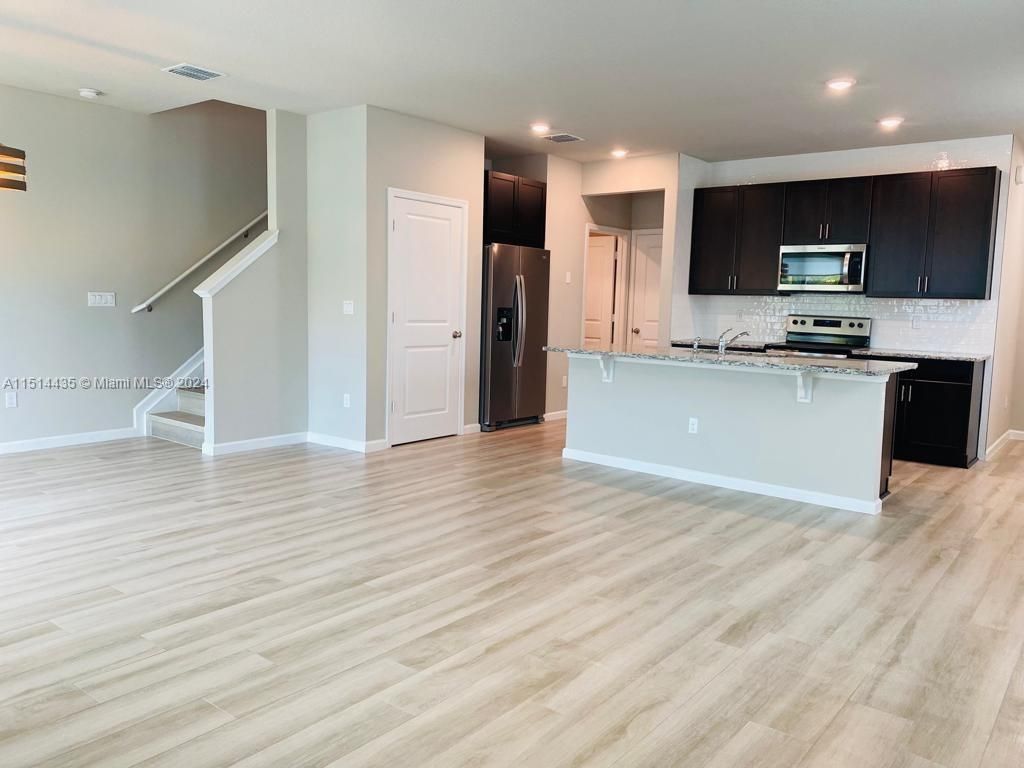 Photo of 214 Osprey Preserve Blvd #214, Jensen Beach, FL 34957 (MLS # A11514435)