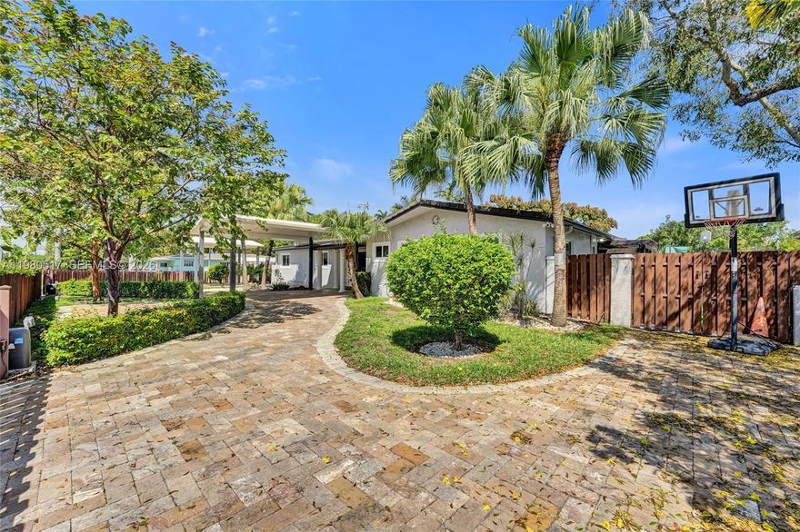 Welcome to 1015 S 14th Ave in Hollywood! This stunning 3-bed, 4-bath home with a den sits on a rare double lot within a gated property and has been fully upgraded in the last 10 years—from appliances to roof. Relax in your screen-covered porch, enjoy a heated pool, and feel secure with impact windows and doors. Modern comforts include central A/C, pool heater, gas water heater, gas drier, and a gas generator. Space, style, and upgrades come together perfectly in this move-in-ready home—don’t miss it!