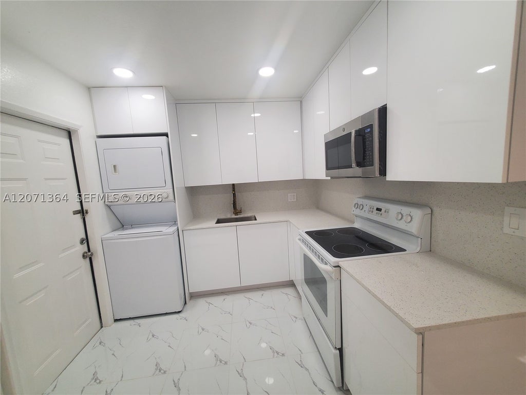 Photo of 9203 NW 38th Dr #2, Coral Springs, FL 33065 (MLS # A12071364)