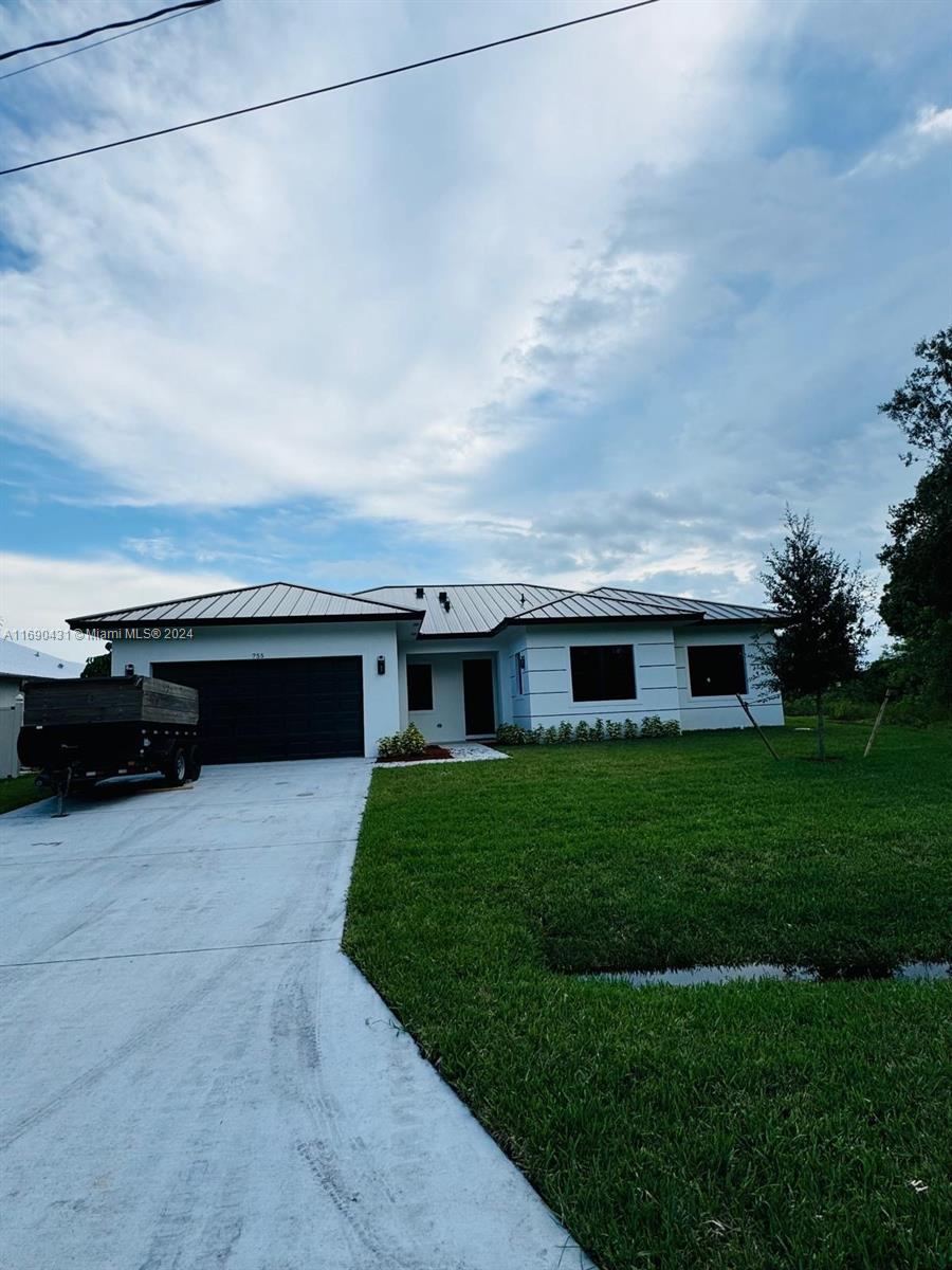 Are you looking for a fresh start in a new home? Look no further! This newly constructed home is ready for its first occupants. Boasting four bedrooms, 3.5 bathrooms, a den/office, impact windows and doors, a brand new roof, a washer/dryer, a two-car garage, and stunning floors. This home has it all. The meticulous attention to detail shines through in every corner, especially in the spectacular kitchen. Don't miss the opportunity to be the first to call this beautiful house your home!