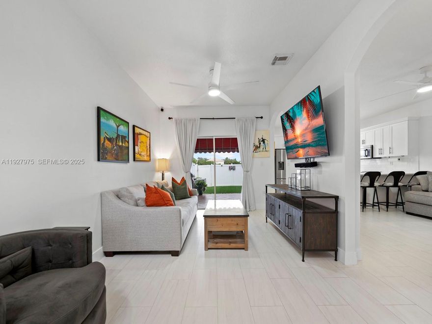 Welcome to this fully renovated 3 bed, 2.5 bath waterfront townhome with a 1-car garage in the wonderful community of Vizcaya. Enjoy dedicated living and dining areas. Entertain with ease in the beautiful kitchen, which features sleek stainless steel appliances and plenty of countertop space. Upstairs, you will find the 3 spacious bedrooms. The primary bedroom hosts a luxurious walk-in closet and ensuite with dual-sink vanities. The second bedroom has a walk-in closet as well. Step out onto the covered patio and you'll be met with a lovely low-maintenance backyard with artificial turf. Community is gated with security patrol. Amenities include community pool and playground. Conveniently located near the Turnpike. Do not miss out on this opportunity!