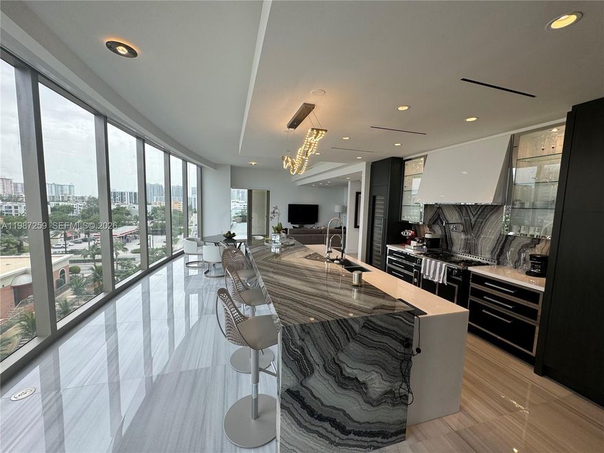 4 BEDROOM/ CONV DEN TO 5 BEDROOM , A RARE CUSTOMIZED DONATELLO 4131 SQFT SE CORNER LIVES LIKE A SINGLE FAMILY HOME , HEAR AND SEE THE OCEAN AND BEACH. HIS AND HER PRIVATE MASTERBATH ,MASTER BEDROOM HAS DIRECT OCEAN VIEWS, SEE ALL THE WAY DOWN THE BEACH,MOVE RIGHT IN, 45000 SQFT OF AMENITIES , FLOW RIDER