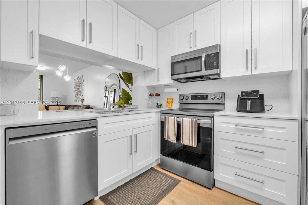 Photo of 1234 S Military Trl #1811, Deerfield Beach, FL 33442 (MLS # A12012153)