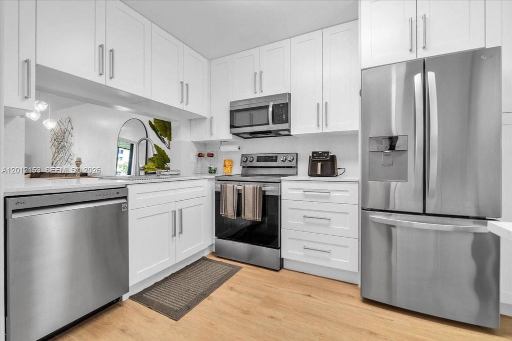 Photo of 1234 S Military Trl #1811, Deerfield Beach, FL 33442 (MLS # A12012153)