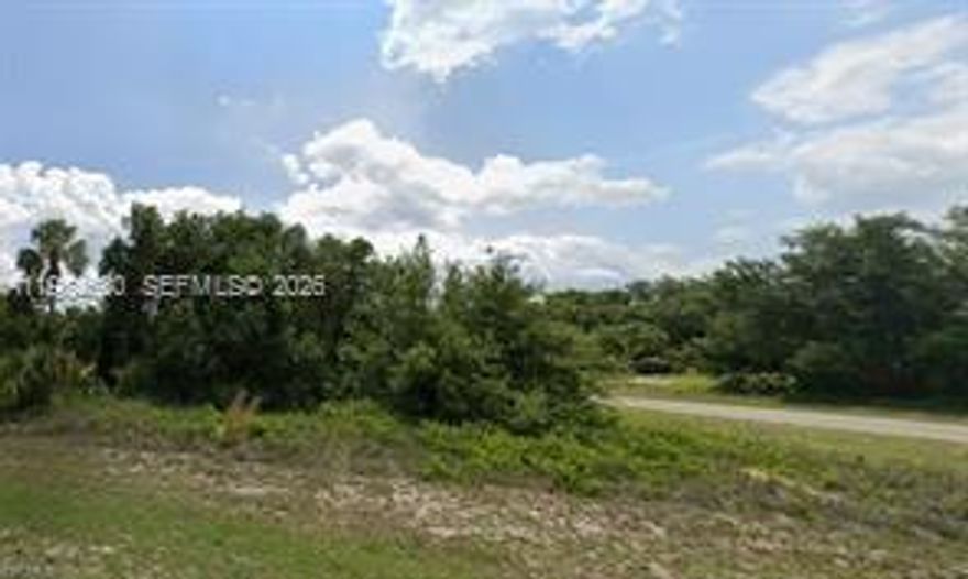 Oversized corner lot, in an area of new homes, with central water lines in place! Located in one of the nicest areas of Port LaBelle, near the Port LaBelle Marina, and in the West Glades "A" Rated school district! This is a great location for your new dream home, or an excellent location for a spec home!