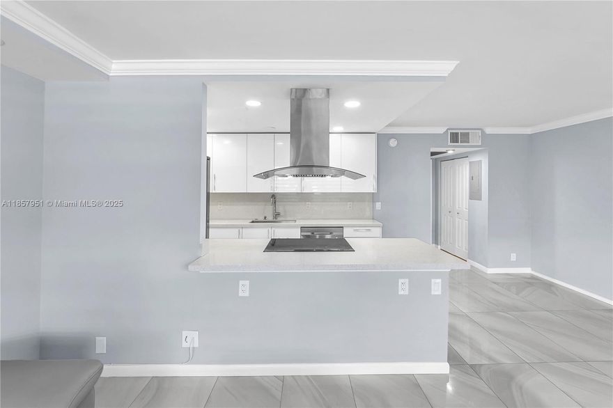 Welcome Home !Stunning, newly renovated condo in an active adult community of Wynmoor. Beautifully updated 1-bedroom condo, renovated to the highest standards. Brand new AC, water heater and electric panel. Every detail has been thoughtfully designed — from the sleek open-concept kitchen with quartz countertops, premium stainless steel appliances, modern fixtures, Italian porcelain tiles. Highly desirable Wynmoor active adult community which offers access to resort-style amenities including golf course, clubhouse, fitness center, heated pools, tennis courts, pickleball courts, live theaters, movie screenings, on site restaurant and 24/7guarded community. Move-in ready, beautifully finished, and perfectly located — this is Florida living at its finest! NO Assessments and 40 Yr Done.
