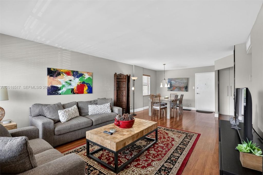 Photo of 401 Golden Isles Dr #208, Hallandale Beach, FL 33009 (MLS # A12018517)
