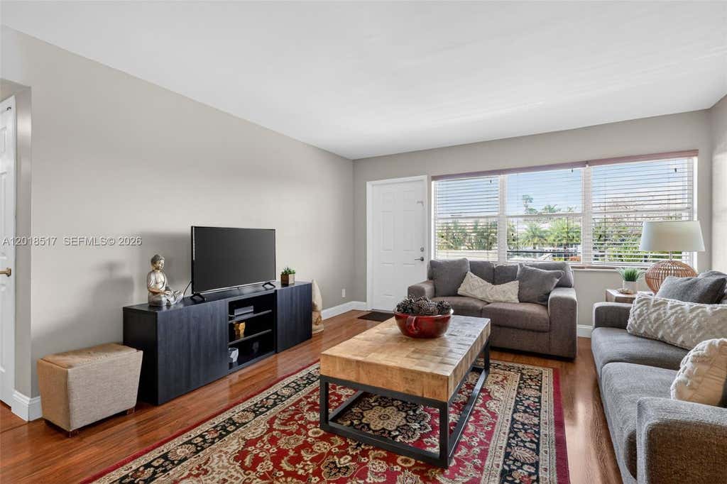 Photo of 401 Golden Isles Dr #208, Hallandale Beach, FL 33009 (MLS # A12018517)