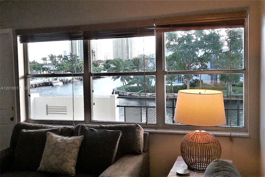 Photo of 401 Golden Isles Dr #208, Hallandale Beach, FL 33009 (MLS # A12018517)