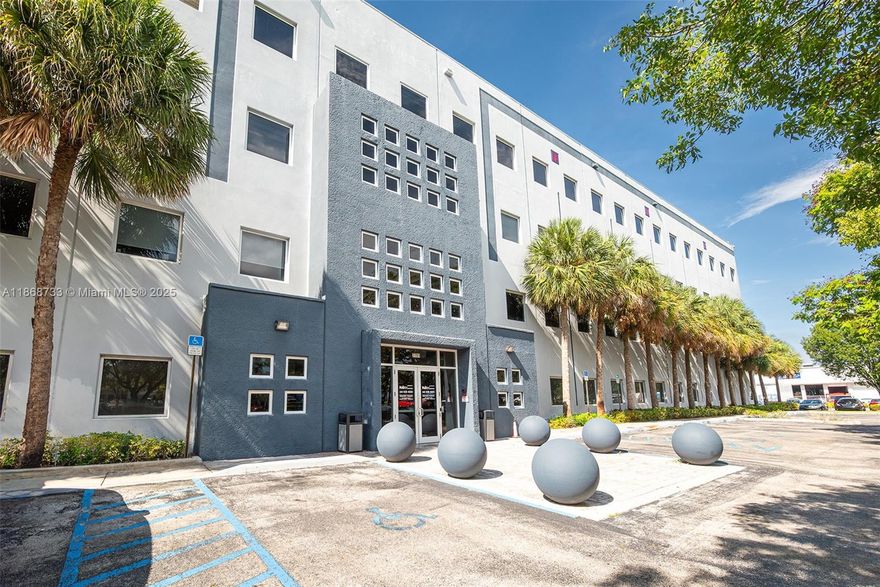 Outstanding opportunity to acquire 2 adjacent, fully built-out offices. While currently separated, these units can be easily combined to create a larger, cohesive workspace. The space is designed with upscale finishes throughout, featuring elegant waiting areas, well-appointed conference rooms, and multiple private offices. Each unit is equipped with its own separate AC unit. Units boast drop ceilings and impact-resistant windows. This offering also includes seven premium-covered parking spaces located on the 2nd floor, providing excellent accessibility. This property is fully finished and designed with an upscale professional image.Ideal for future growth or expansion for a business. Prime location for any business seeking a prestigious office presence