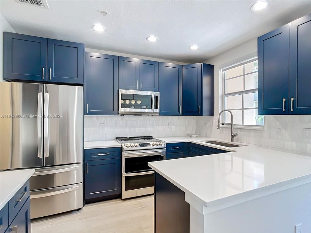 Photo of 2526 Gardens Parkway, Palm Beach Gardens, FL 33410 (MLS # A11642386)