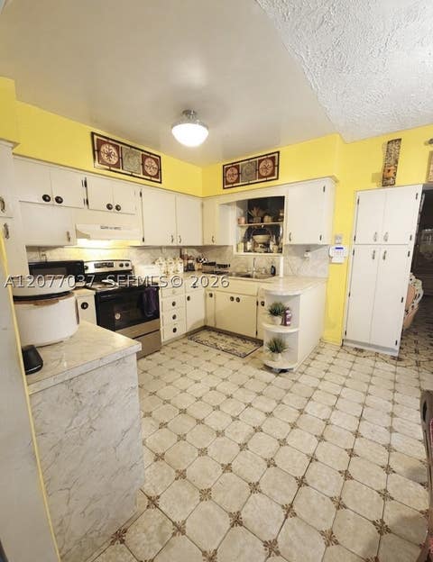 Tiny photo for 8210 NW 34th Ave, Miami, FL 33147 (MLS # A12077037)