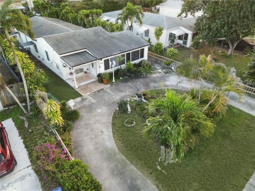 Search no more. Welcome to your tropical escape in North Miami Beach! Situated on a 5,749 sq. ft. lot, this charming home is bathed in natural light and offers flexible living spaces. The expansive backyard is ideal for entertaining, gardening, or adding a pool. Enjoy complete privacy, with lush gardens surrounding the property. Conveniently located minutes from Aventura Mall, Sunny Isles Beach, and top-rated schools, this home combines comfort, opportunity, and an unbeatable location. Open-minded about leveling up your living game? This is it! *Do NOT visit the property without prior notice. Owner-occupied. All showings must be scheduled in advance.*