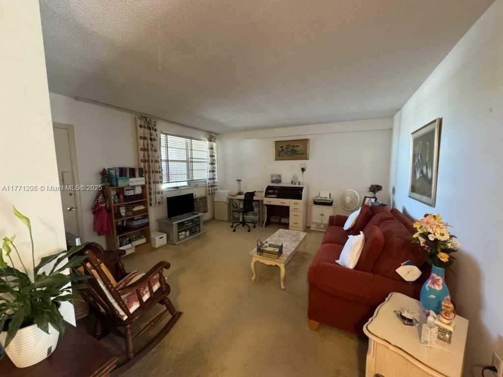 Welcome to an Exclusive 55+ community of Mar Len Gardens. This charming 1 bedroom 1 bath located in North Miami Beach. Upon entrance you are greeted with a spacious living room with carpet. Original kitchen with appliance and a second entrance to the unit. Down the semi hallway is a storage closet for personal items. One bedroom & bath to your right. A beautiful balcony for enjoyment. This community has tons of amenities for involvement. It includes two pools, a gym, and a clubhouse for entertainment. Close proximity to Oleta Park, local restaurants, and the beach. mins away from I-95 Express & Biscayne Blvd, Call NOW for a showing!