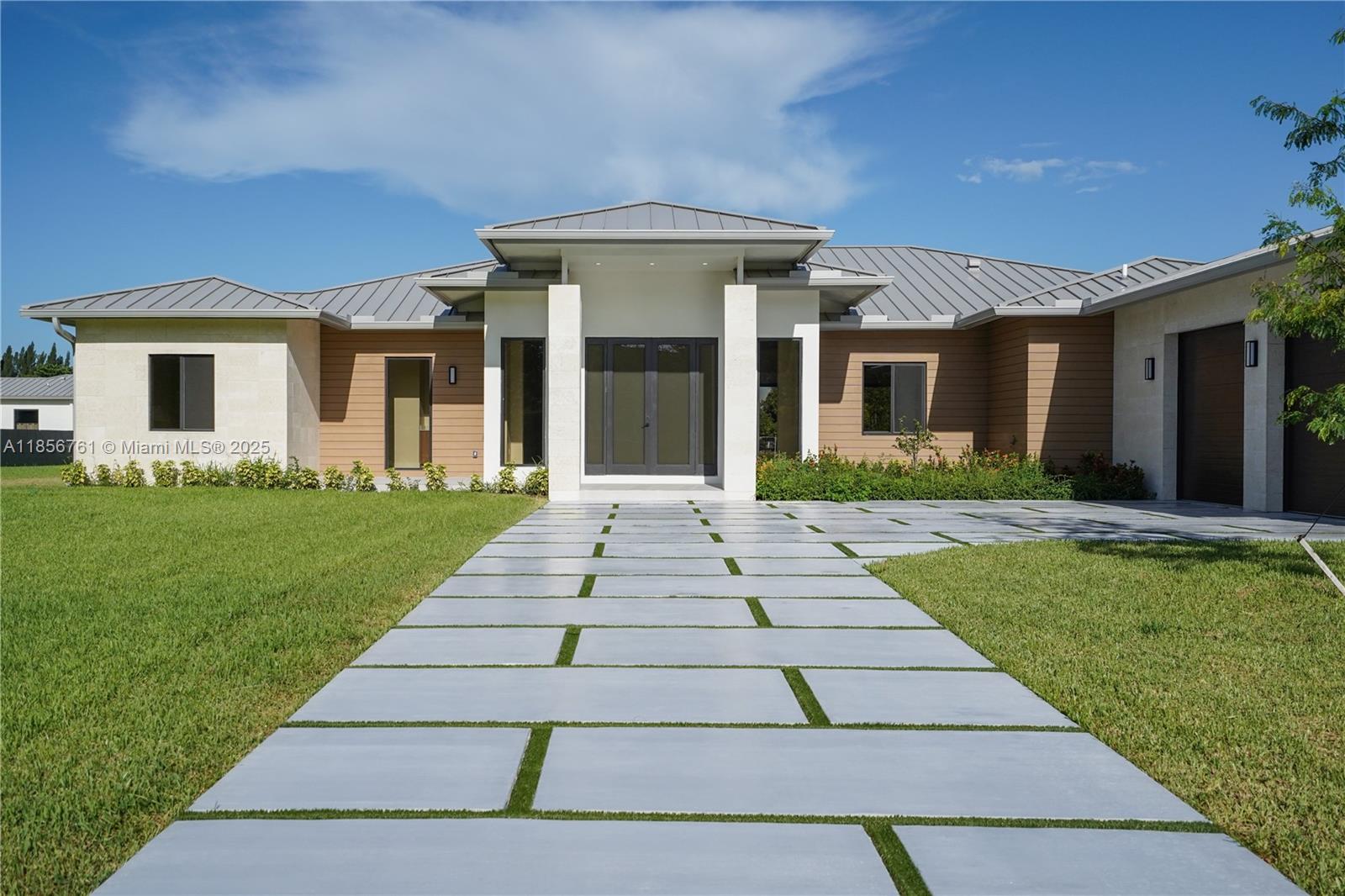 Luxury New Construction Home in Homestead on a Large Lot. Discover this new construction home offering 4000 S.F. of air-conditioned living space on a spacious 1-acre lot. This stunning residence features 5 spacious bedrooms and 6 luxurious bathrooms. The gourmet kitchen is a chef's dream with stainless steel appliances and elegant quartzite countertops. Bathrooms are beautifully appointed with marble countertops. Enjoy outdoor living with a private pool and hot tub. 3 car garage. City water.