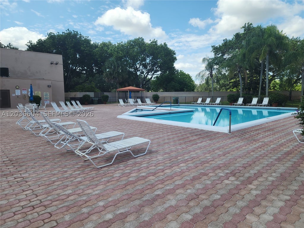 Photo of 12305 NW 11th Ct #12305, Pembroke Pines, FL 33026 (MLS # A12036604)