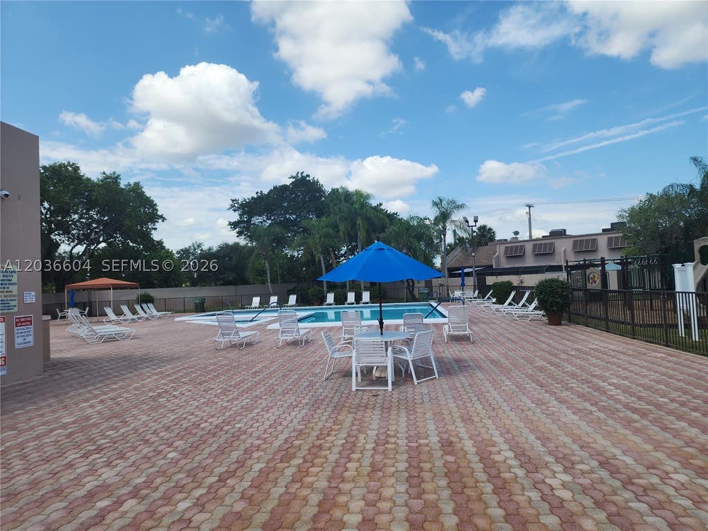 Photo of 12305 NW 11th Ct #12305, Pembroke Pines, FL 33026 (MLS # A12036604)