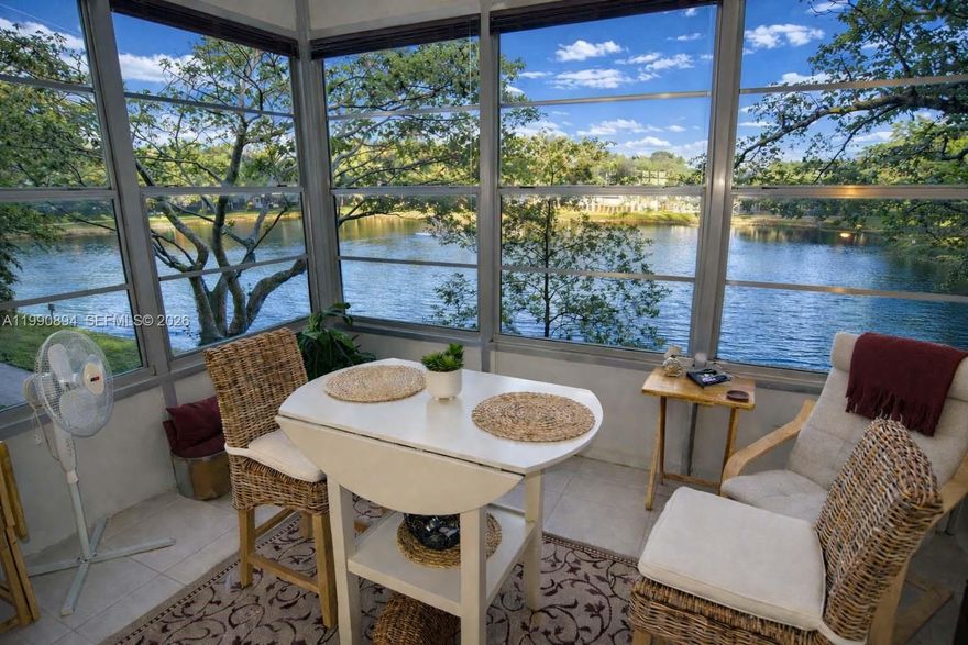 Amazing lake views from every room. This tastefully renovated, fully furnished 2nd-floor condo features a spacious layout, a modern kitchen, a comfortable living area, and ample natural light. Located in a well-maintained community, this unit offers convenience, privacy, and easy access to nearby amenities. Move-in ready and ideal for comfortable living. features white kitchen cabinets, stainless steel appliances, white tile floors, and stylish wood accent walls. The enclosed balcony adds extra living space under the air, perfect for relaxing and enjoying the view. Located in a quiet and well maintained 55+ condo community, centrally located to everything. Just minutes from the Turnpike and about 10 minutes to I-95, with easy access to restaurants, shopping, and daily conveniences. Residents enjoy an active lifestyle with great amenities including a heated swimming pool open year round, gym, shuffleboard, dance classes, and an active clubhouse. Take a peaceful walk along the beautiful trails and enjoy views of the lake and gardens, or spend time by the pool and barbecue area. Association requirements: Minimum 670 credit score required for approval. No pets allowed.