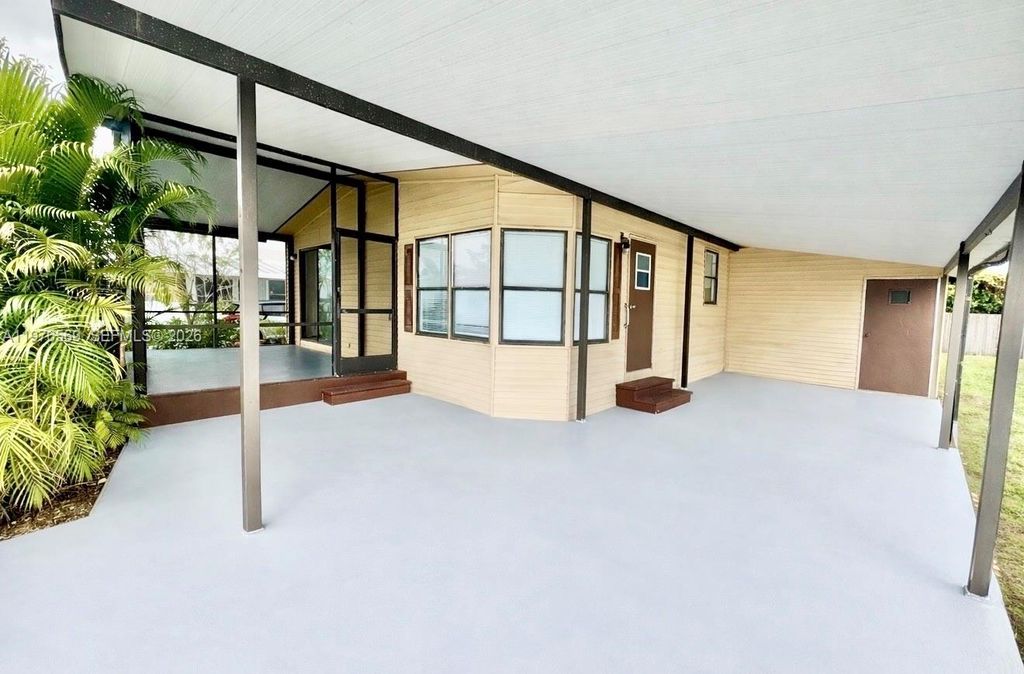 Photo of 6156 Seashore Drive, Atlantis, FL 33462 (MLS # A11976569)