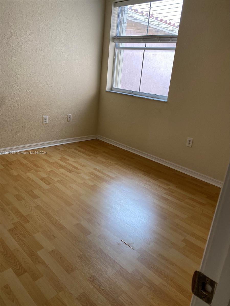 THE COURTS AT DORAL ISLES - Residential Lease