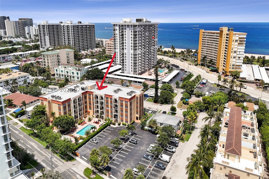 Photo of 400 N Riverside Dr #303, Pompano Beach, FL 33062 (MLS # A12090357)