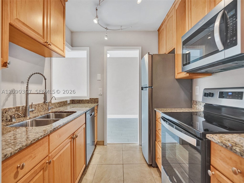 Photo of 400 N Riverside Dr #303, Pompano Beach, FL 33062 (MLS # A12090357)