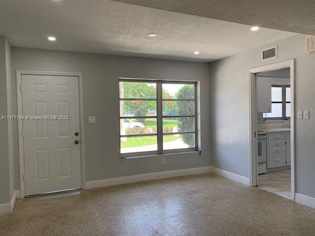 Photo of 326 E Ilex Dr, Lake Park, FL 33403 (MLS # A11477104)