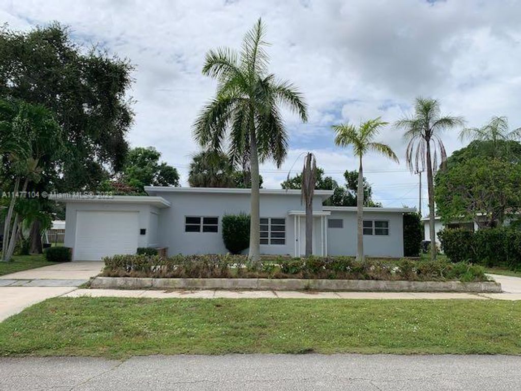 Photo of 326 E Ilex Dr, Lake Park, FL 33403 (MLS # A11477104)