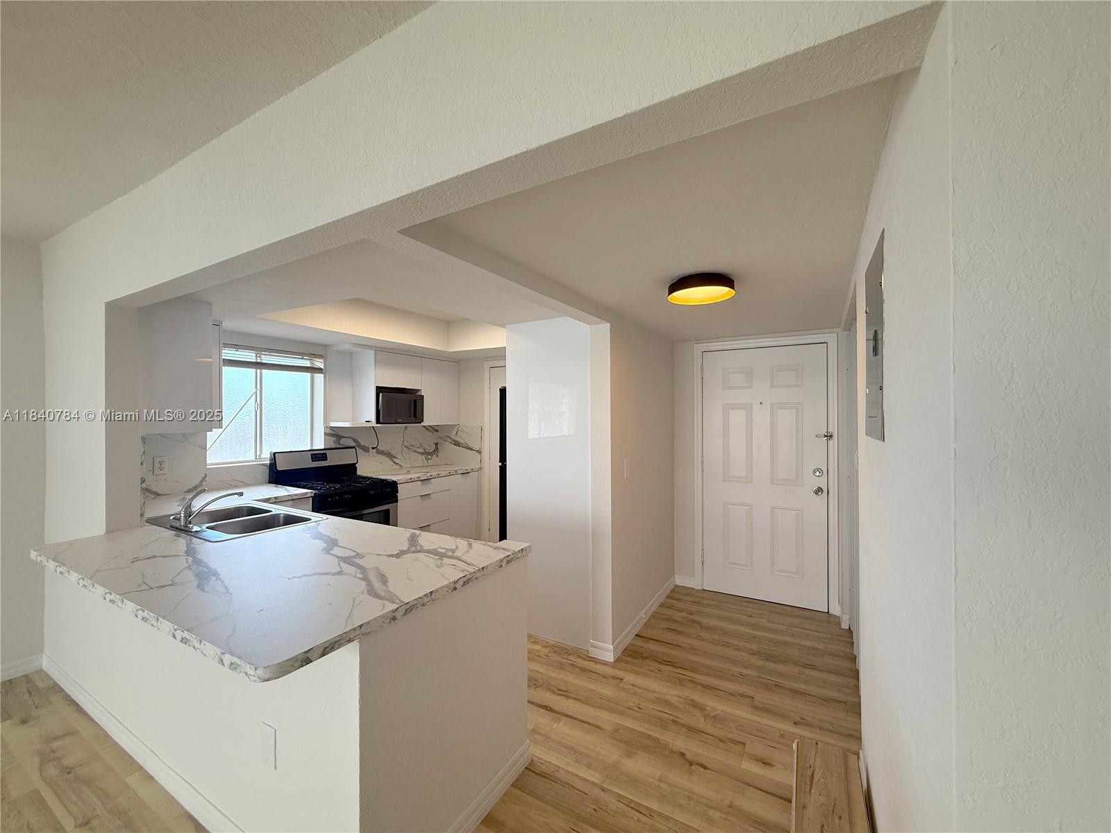 Fully renovated 2-bedroom, 2-bathroom unit located on the second floor in the heart of Dadeland. This bright and modern apartment offers updated kitchen and bathrooms, spacious layout, and private balcony. Excellent location—just minutes from major highways (US-1, Palmetto, Snapper Creek), Dadeland Mall, grocery stores, top-rated schools, and dining. Quiet and well-maintained community with pool and laundry facilities. Assigned parking included. Fast approval. Perfect for professionals or families seeking comfort and convenience in a highly desirable area.