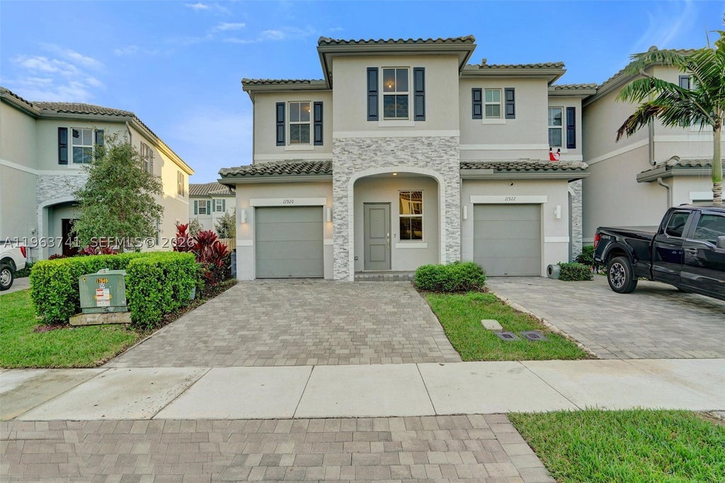 Photo of 11920 NW 47th Mnr, Coral Springs, FL 33076 (MLS # A11963741)