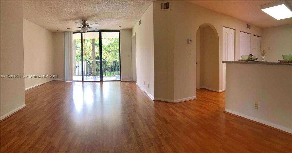 Photo of 10121 W Sunrise Blvd #204, Plantation, FL 33322 (MLS # A11381051)