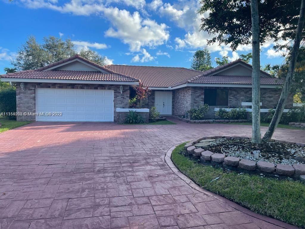 Photo of 4955 NW 84th Rd, Coral Springs, FL 33067 (MLS # A11354298)