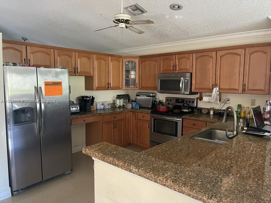 Photo of 4955 NW 84th Rd, Coral Springs, FL 33067 (MLS # A11354298)