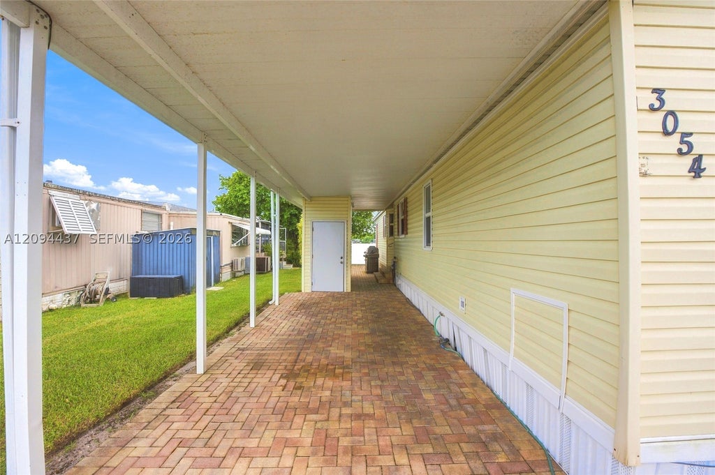 Photo of 3054 Lakeshore Dr, Dania Beach, FL 33312 (MLS # A12094437)