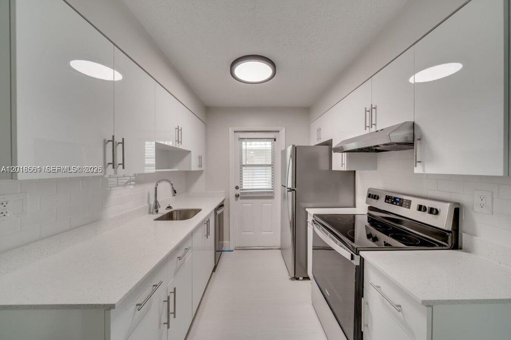 Photo of 841 SW 74 Ter #201E, North Lauderdale, FL 33068 (MLS # A12018561)