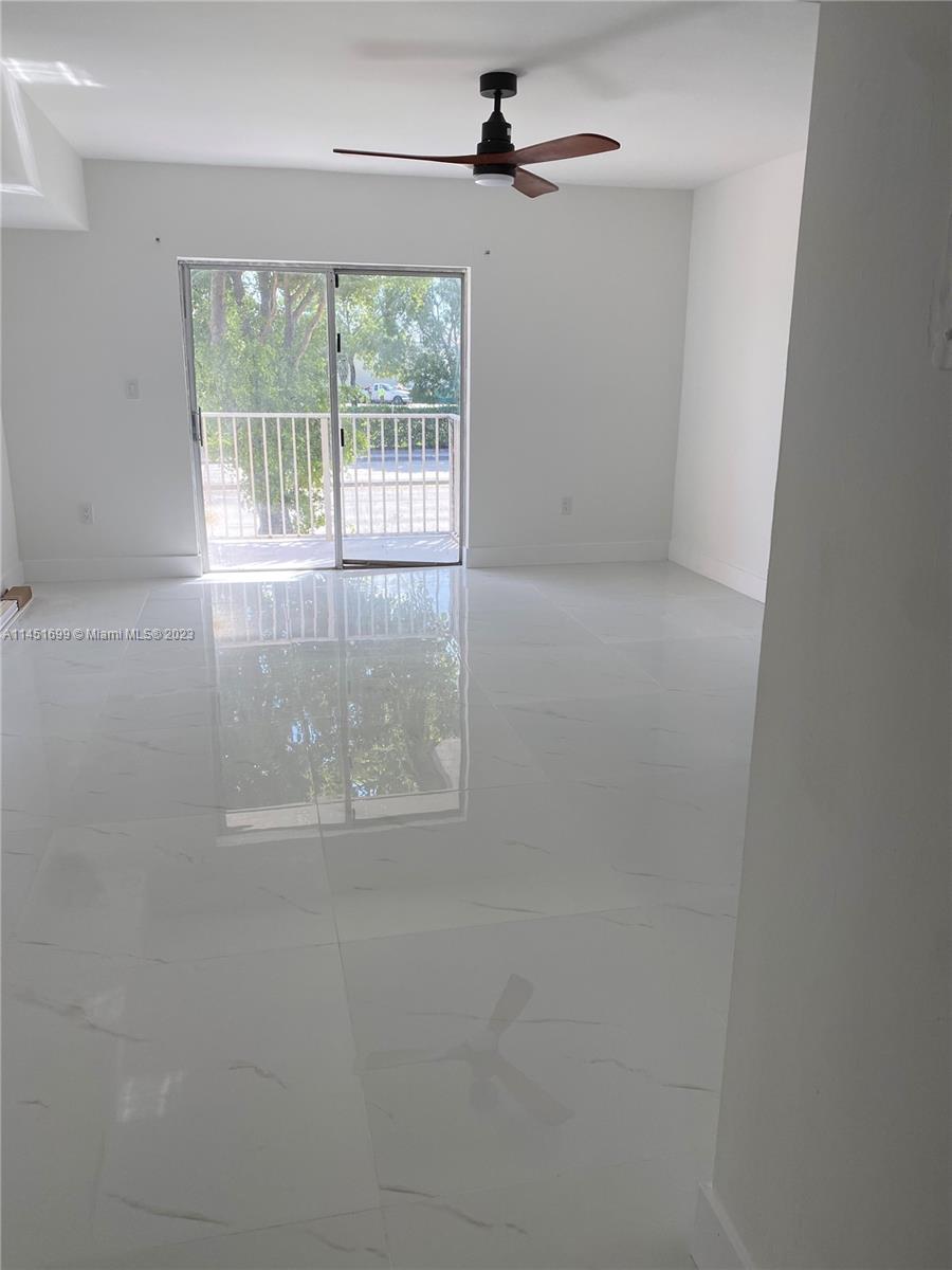 Light and bright completly renovated spacious 2 bedroom 1.5 bathroom two story townhouse condo centrally located in front of FIU Engineering Campus.