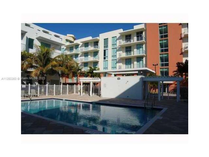 This unique loft residence features 12 foot ceilings and generous open, flexible design space. Contemporary kitchen with granite counter tops, stainless steel appliances, full size washer/dryer inside unit, spa bathtub, impact resistant windows, storage space, pre-wired for telephone/satellite/internet. Beautiful landscaped pool area, secure parking garage. Near Hollywood shopping, dining and entertainment.