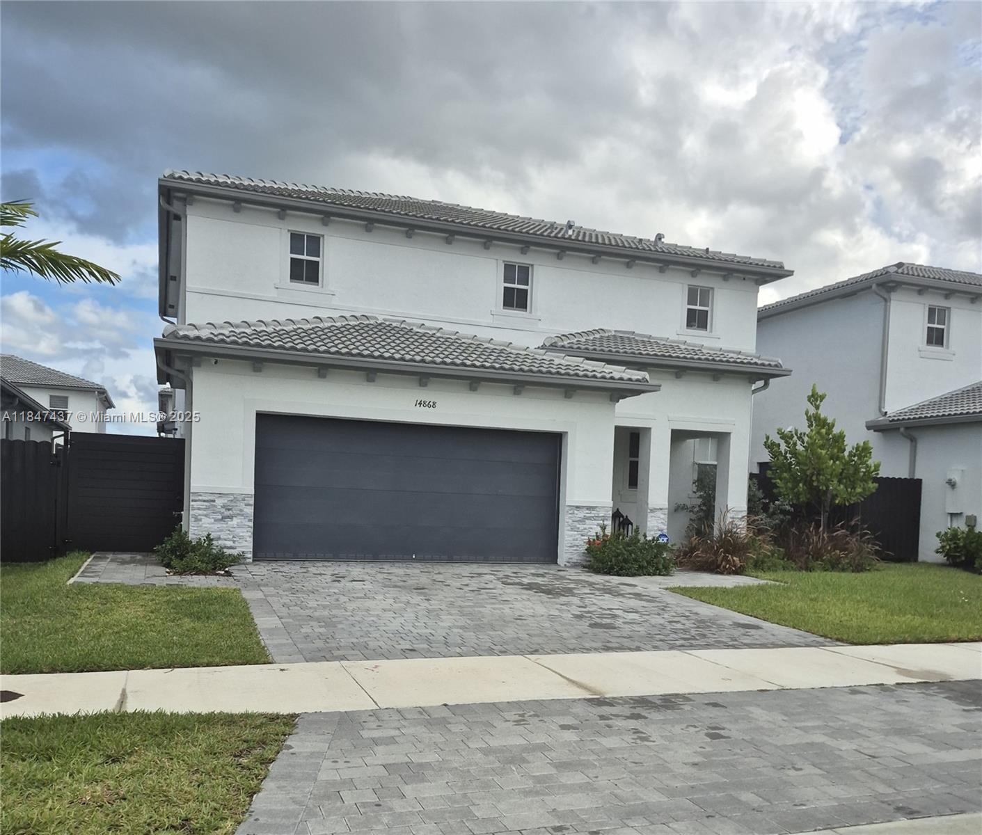 High quality living. Unique opportunity, BRAND NEW. PIANI Next Generation Model. 4 Bedrooms, Master room with 2 huge closets 2.5 Baths. Master Bath has porcelain tile with mosaic tile hexagon floor. Rainfall shower. 32 x32 Porcelain rectified polished tile flooring throughout, granite island counter top. Open living room with customized wood accent wall. Stainless steel appliances. 2 car garage, optional full boxing gym inside garage. Brick paver driveway. Ring cameras. Living room, Laundry room. Zebra blackout blinds, fenced-in back yard, close to Main Highways, Excellent Schools, Miami Executive Airport, Larry and Penny Thompson Memorial Park, Shopping Centers, Miami Zoo and much more!! No HOA.