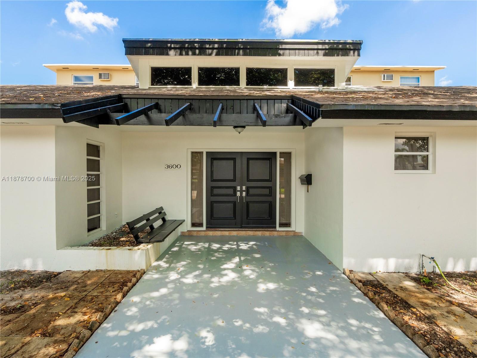 Spacious 2-bedroom and 2-bathroom home in Hialeah with vaulted ceilings, grand kitchen, laundry, outdoor patio and a large storage shed.