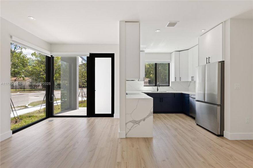 Contemporary luxury with this new 2025 construction home in Miami. Home features 3 bedrooms and 3 bathrooms, each bedroom has an in-suite bathroom, Italian styled kitchen, 18 foot ceilings, lots of natural light, a laundry, and parking for 3 cars and additional street parking, convenience meets style. Beyond the sleek design, residents will relish the private backyard, a tranquil escape for entertaining or for pets. Its location is heightened by its imminent Magic City Innovation District and swift access to Miami's hots-pots and Michelin rated restaurants, including the Miami Design District, Upper Buena Vista, Midtown, Edgewater, Wynwood, Miami Beach, and Downtown Miami. Video Tour in the link.