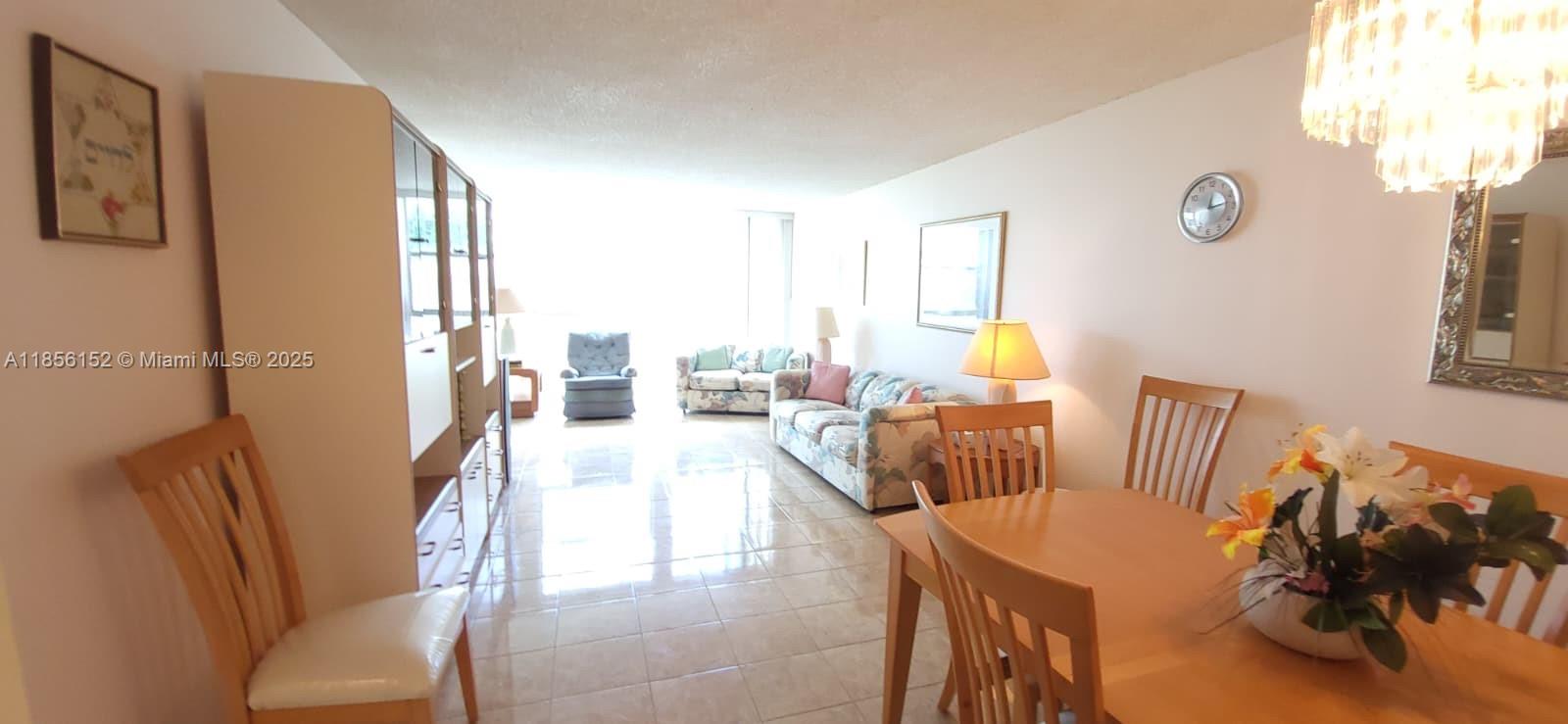 INVESTORS DREAM! Large 1 bedroom apartment plus den, 1 full and 1/2 bathrooms. Floor to ceiling windows. Den can be easily converted to a second bedroom. Tile floor throughout. Prime location in the nice Hallandale Beach neighborhood. 1 assigned parking and storage included. Guest parking is available. Amenities offer large heated swimming pool and tennis court overlooking beautiful canal across expensive Diplomat Pkwy. Watch amazing sunset and yacht passing by! Joseph Scavo public park with children playground across the road. Hallandale Beach is about 15 minutes walking distance. 10 minutes walking distance to shopping, Walmart, stores and restaurants. New private Golf course is just across the complex. A new owner can move-in or rent apartment from Day 1 after purchase!