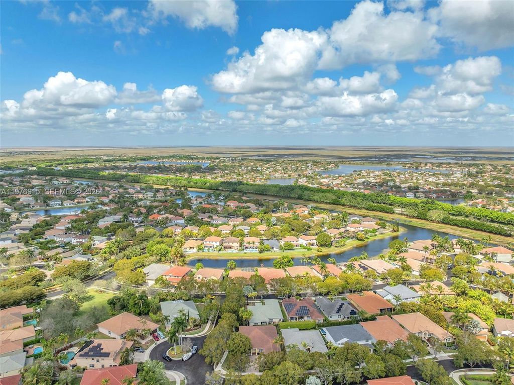 Photo of 1435 Cardinal Way, Weston, FL 33327 (MLS # A11976915)