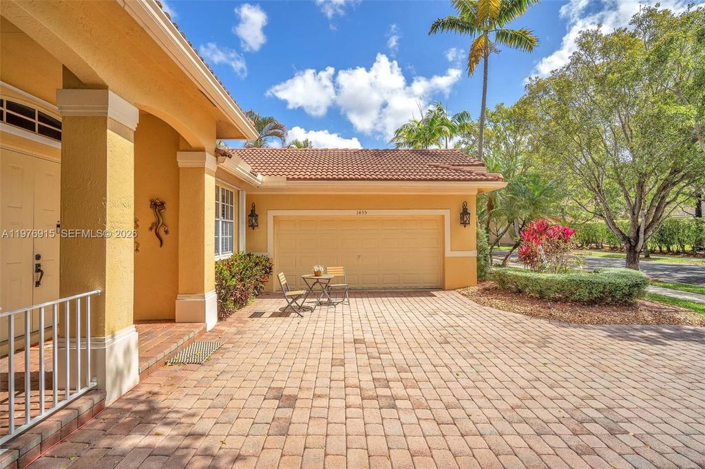 Photo of 1435 Cardinal Way, Weston, FL 33327 (MLS # A11976915)