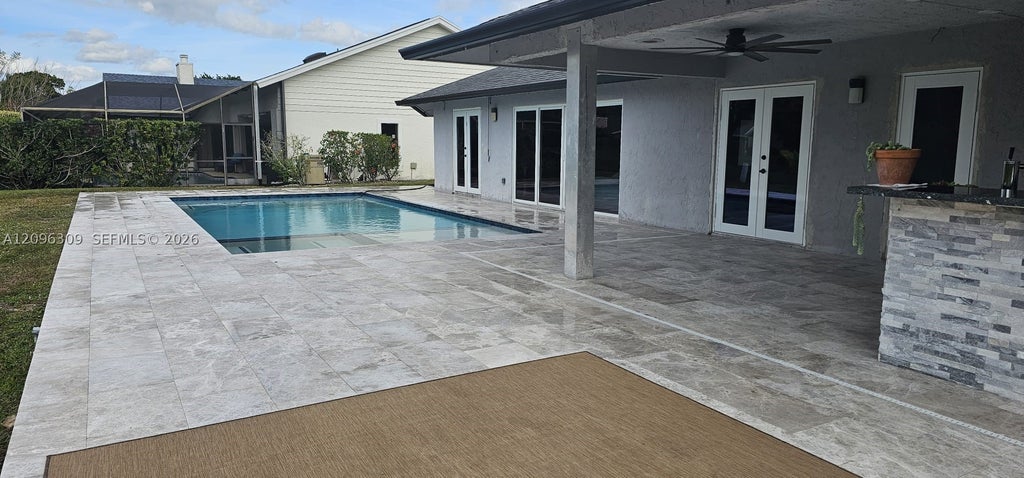Photo of 712 Juniper Pl, Wellington, FL 33414 (MLS # A12096309)