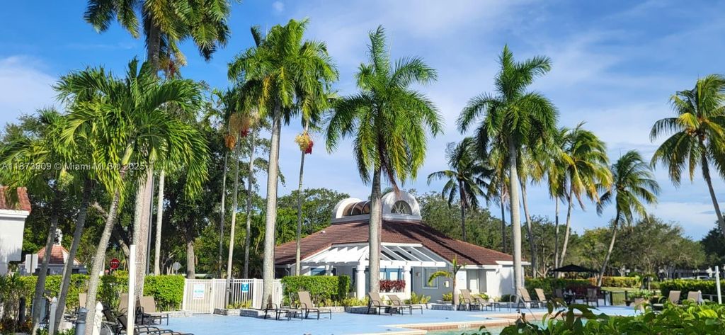 Photo of 631 Lyons Rd #12102, Coconut Creek, FL 33063 (MLS # A11873809)