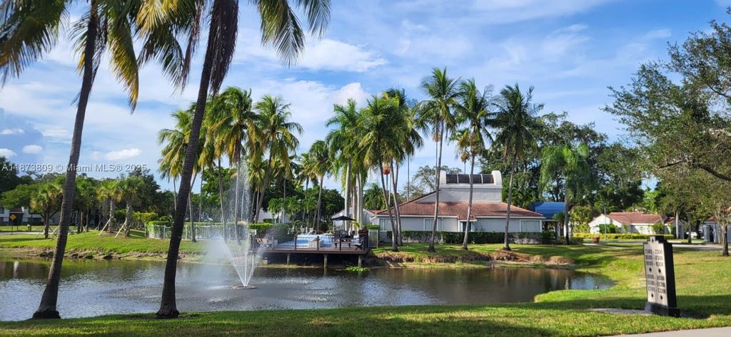 Photo of 631 Lyons Rd #12102, Coconut Creek, FL 33063 (MLS # A11873809)