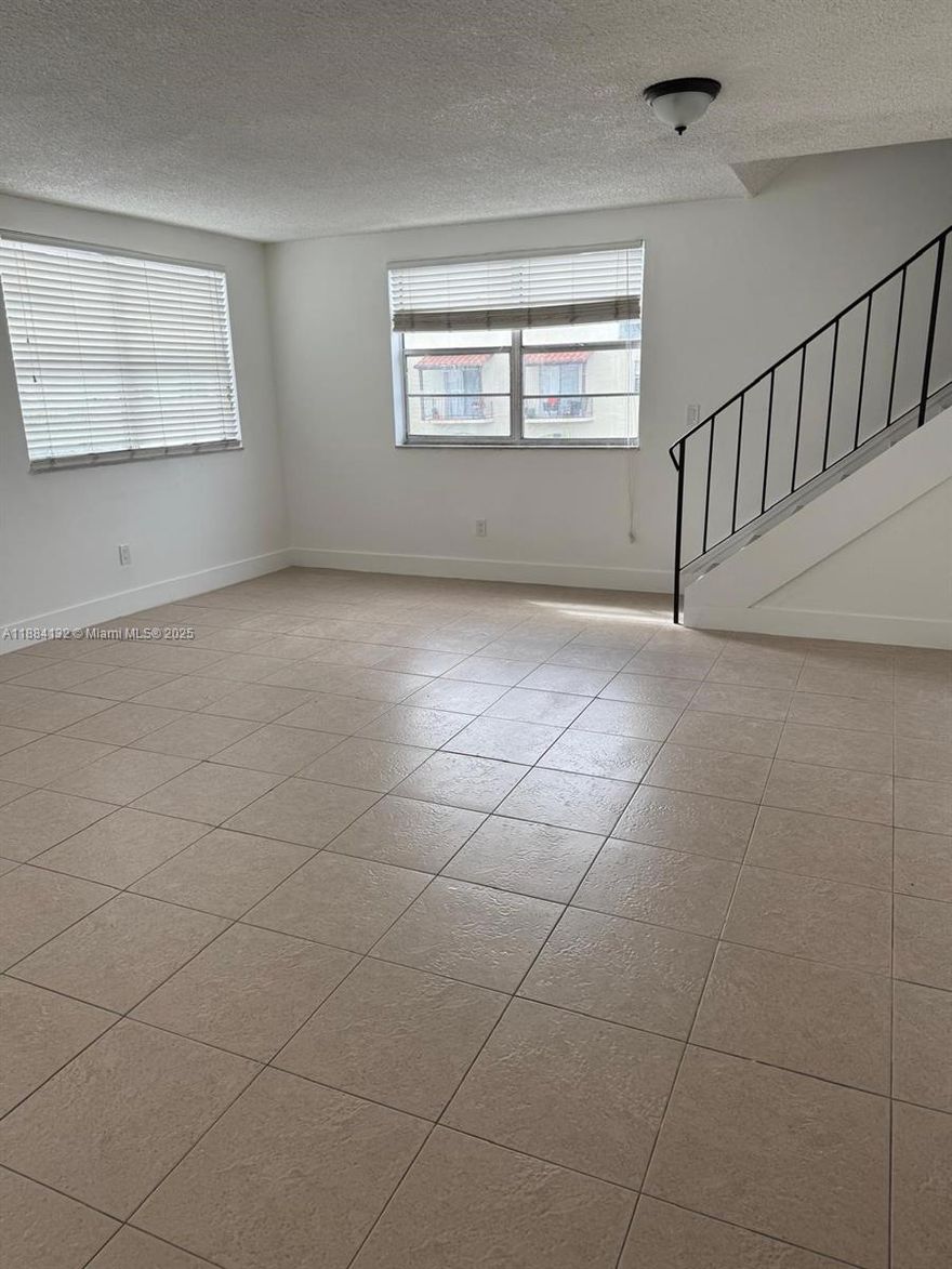 Located in the heart of Hialeah. Spacious two floors unit with balcony. Renovated 2 bathrooms and 1.5 bath. Brand now appliances Within walking distance to shopping, restaurants and minutes from Palmetto Expressway and Westland Mall. Perfect for Investors or first time buyers.