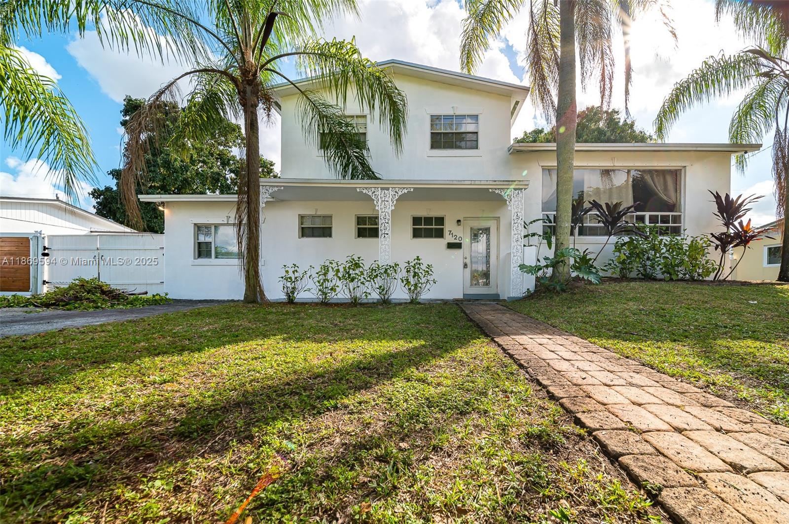 his stunning two-story home located at 7120 Duval St, Hollywood, offers 5 spacious bedrooms plus a den, perfect for a home office or extra living space. With 2 full baths, this home provides ample room for a large family or guests. Step inside to find an open-concept layout with plenty of natural light throughout the home. The kitchen has been updated with modern appliances, ample storage, and a breakfast bar, making it easy to entertain guests. The backyard is an entertainer's paradise, boasting a sparkling pool and spa, perfect for those hot summer days. The outdoor space is perfect for hosting barbecues, parties, or just lounging with family and friends.