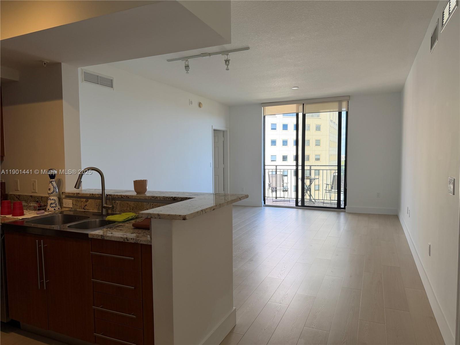 PUERTA DE PALMAS CONDO - Residential